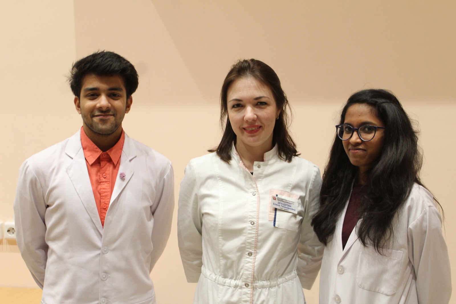 Dr. Shivang with Indian students and a Russian faculty doctor during MBBS training